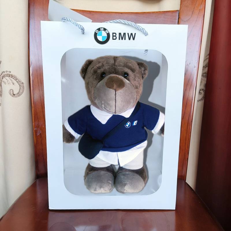 A bear and a gift bag